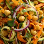 Refreshing Chickpea, Carrot & Zucchini Salad with Zesty Ginger Dressing