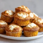 Delicious Pumpkin Cream Cheese Swirl Muffins - Easy Fall Baking!